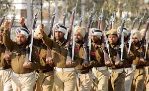 Punjab Home Guard jawans rehearse for the Republic Day parade at Government College in Ludhiana on Thursday.