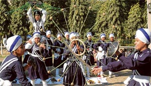 Students of GCW depicting their skills in Gatka (Khalsa marshal art) during a practise session in Ludhiana on Thursday.