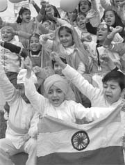 Tiny-tots of a Mohali school exhibit patriotic fervour during R-Day celebrations on Friday.