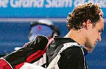 Swiss Roger Federer leaves the court following defeat in his mens semi-final singles match against Serbian opponent Novak Djokovic at the Australian Open in Melbourne on Friday. Djokovic won 7-5. 6-3. 7-6.