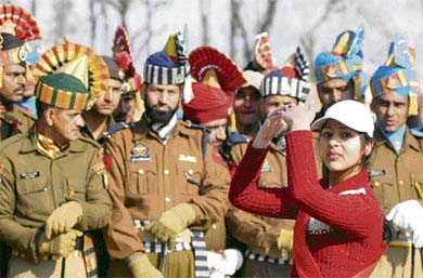 A schoolgirl performs during the Republic Day parade at the Bakshi Stadium in Srinagar.