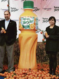 PepsiCo India CEO Sanjeev Chadha with vice-president, innovation, Sucheta Govil, at the launch of "Tropicana Twister", an orange fruit drink, in New Delhi on Monday.