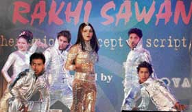 Rakhi Sawant takes part in a dance programme in Faridabad on Monday. 