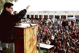 Rohtak MP Deepender Hooda addresses villagers at Ladhaut on Monday. 