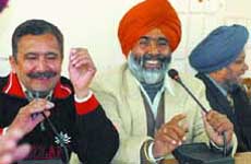 Bhupinder Singh Ghumman, president, Jalandhar Dairies Association, addresses a press conference in Jalandhar on Monday. 