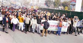 All-Jammu and Kashmir State Transport Employees Union protesting for the acceptance of their demands in Jammu on Monday