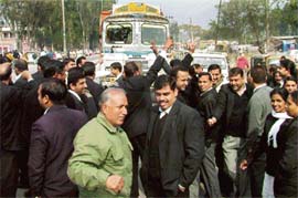 Advocates block traffic on the Panckula-Kalka highway in Panchkula inconveniencing commuters on Tuesday.