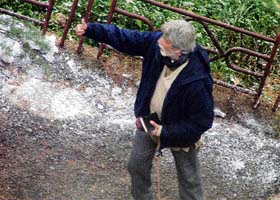 Big B enacts a scene during the shooting of Shoe Bite in Shimla