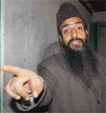 ammu and Kashmir Ahlihadees chief Molvi Shauket Shah talking to mediapersons on Tuesday.