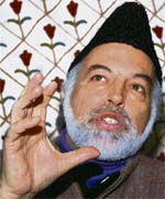 Jammu and Kashmir Awami National Conference senior leader and intra-Kashmir organising committee chairman Muzaffar Shah addressing a news conference in Srinagar on Tuesday.