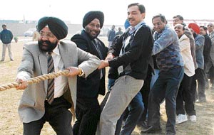 A tug of war match in progress during the DMCH annual athletics meet in Ludhiana on Tuesday.