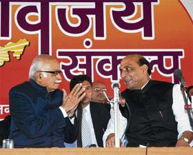BJP leader L.K,. Advani and party president Rajnath Singh at the National Council Conference of the party in New Delhi