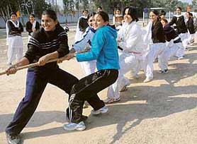 Girls show their strength at tug-of-war at the atheletics meet held at Sri Guru Gobind Singh College for Women in Sector 26, Chandigarh, on Wednesday.