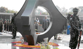 Governor of Punjab Gen S.F. Rodrigues (retd) pays tributes at the Chandigarh War Memorial on the occasion of Martyrs Day in Chandigarh on Wednesday.