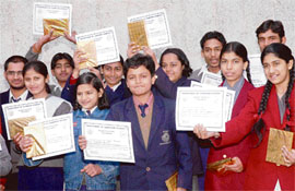 Winners of declamation and on-the-spot painting competition after receiving certificates and prizes at a function organised by the Department of Gandhian Studies, Panjab University, in Chandigarh on Wednesday.