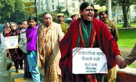 AIDWA activists form a human chain at Patel Chowk on Martyrs Day to condemn attacks on women and minorities in the Capital on Wednesday.