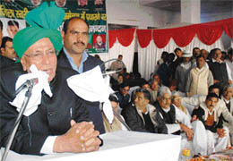 Former Chief Minister Om Prakash Chautala addresses a district-level meeting of the INLDs backward cell in Karnal on Wednesday. 