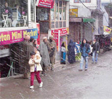 A view of snowfall at McLeodganj on Wednesday.