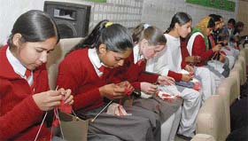 Students take part in the aao bune knitting contest at Guru Nanak Bhawan in Ludhiana