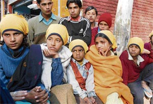 Children of Sangrur farmers, who had committed suicide, at a press conference on the occassion of the 60th death annivesary of Mahatma Gandhi in New Delhi on Wednesday.