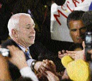 US Republican presidential candidate Senator John McCain (left) greets supporters after his win in the Florida primary at his election night rally in Miami on Tuesday.