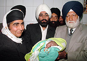The two-month-old baby, who was abondened by her parents, being handed over to Bibi Sohanjit, chief administrator, Mata Gujri Sahara Trust of Patiala, in Amritsar.