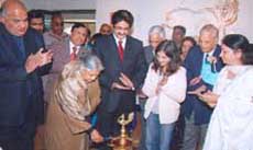 Delhi Chief Minister Sheila Dikshit inaugurates a painting exhibition of Shimla-based artist Deepa Bandhu at Experimental Art Gallery, India Habitat Center in the Capital on Friday.