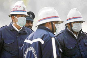 Traffic policemen deputed near the 22nd Surajkund Crafts Mela site in Surajkund on Friday.