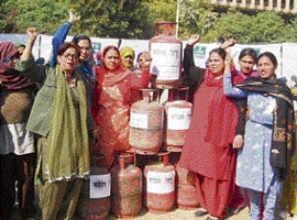 Women supporters of the Indian National Lok Dal stage a demonstration against the shortage of cooking gas in Hisar on Friday.