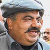 Samajwadi Party MP Atiq Ahmed being taken to the Tis Hazari courts after he was arrested in New Delhi on Friday.