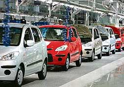 An employee of Hyundai Motor India works in the newly inaugurated plant in Sriperumbudur on Saturday.
