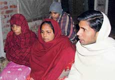 Family members of Praveen, who was allegedly murdered, mourn the killing in Chholi village in Yamunanagar district on Friday. 