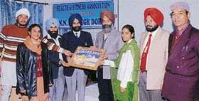 Dr Paramvir Singh welcomed by the physical education department of G.N.N. College on Saturday. 