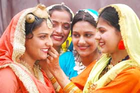 Students of Baba Farid Institute of Higher and Foreign Studies getting ready for the annual day celebrations in Bathinda on Sunday. 