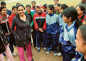 Hema Malini interacts with baseball players in Chandigarh on Sunday.