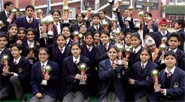 Students, who won medals in the annual athletics meet of Kundan Vidya Mandir in Ludhiana on Sunday.