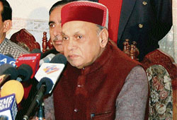 Chief Minister Prem Kumar Dhumal speaks at a function organised by the Una Press Club