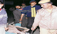 The body of the victim being carried away