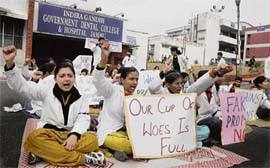 Students of Indira Gandhi Government Dental College and Hospital protesting in Jammu on Monday. Dental students have been demanding accreditation of their course by the Dental Council of India.