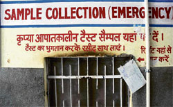 This window is usually shut, there is no staff at the emergency sample collection centre