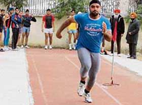 Aspirants appear for trials, conducted to select players for admission to the Sports Authority of India (SAI) training centre, in Ludhiana on Tuesday.