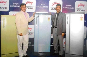 George Menezes , COO, Godrej Appliances (R), and Kamal Nandi, vice-president, Sales & Marketing, Godrej Appliances, during the launch of a complete range of refrigetors with 5-star energy rating, in New Delhi on Wednesday.