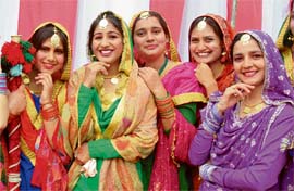 Girls await their turn to perform during a cultural function at Polytechnic College for Women in Patiala on Thursday. 