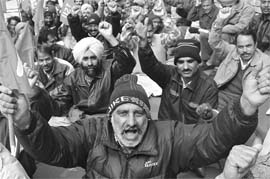 PSEB employees hold a dharna in Mohali on Thursday.