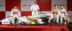 Force India drivers Giancarlo Fisichella (L) and Adrian Sutil (R) with team co-owner Vijay Mallya at the launch of the teams new car in Mumbai on Thursday. 