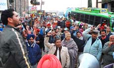 Teachers protesting outside the bus stand brought traffic to a halt in Bathinda on Friday.