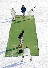 A match in progress during the Cricket on Ice event on the frozen lake of St Moritz, Switzerland, on January 31