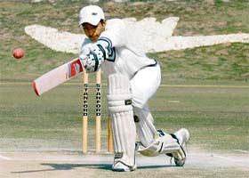 A player plays a shot during the inter-school u-19 cricket tournament for Advisers Cup at Sector-16 cricket stadium in Chandigarh