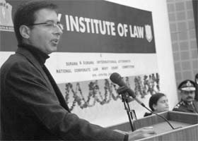 Randeep Singh Surjewala addresses a gathering during the national moot court competition at Army Institute of Law in Mohali