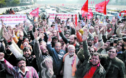All Delhi School Van Operators Welfare Association members with Delhi BJP leader Jagdish Mukhi demand discount in VAT at Ram Lila Ground in the Capital
